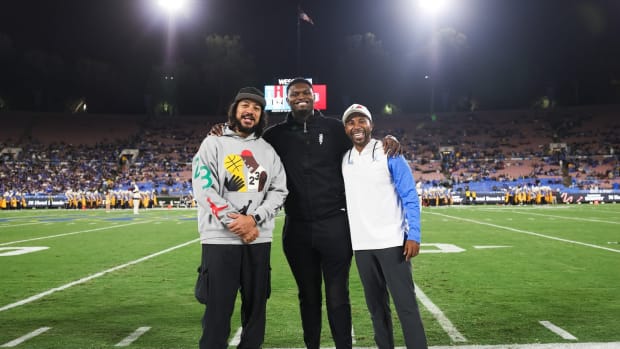 Zion Williamson poses for picture at UCLA game.